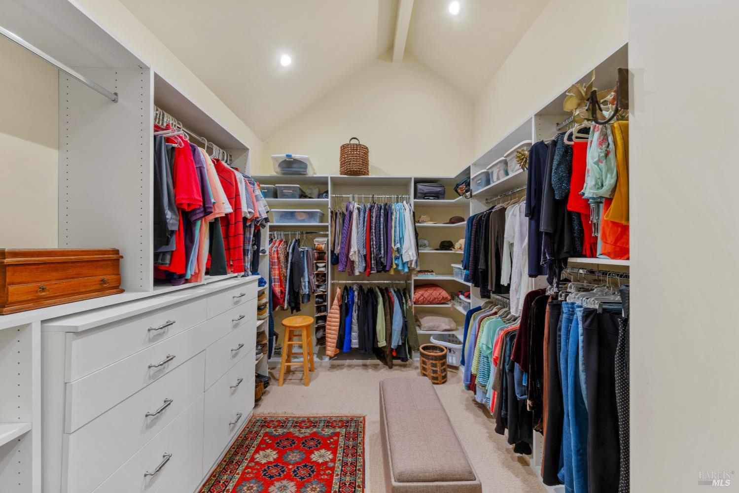 1245 Castle Road Sonoma, CA 95476 - Photo 14 of 48 a view of walk in closet with clothes and shoes