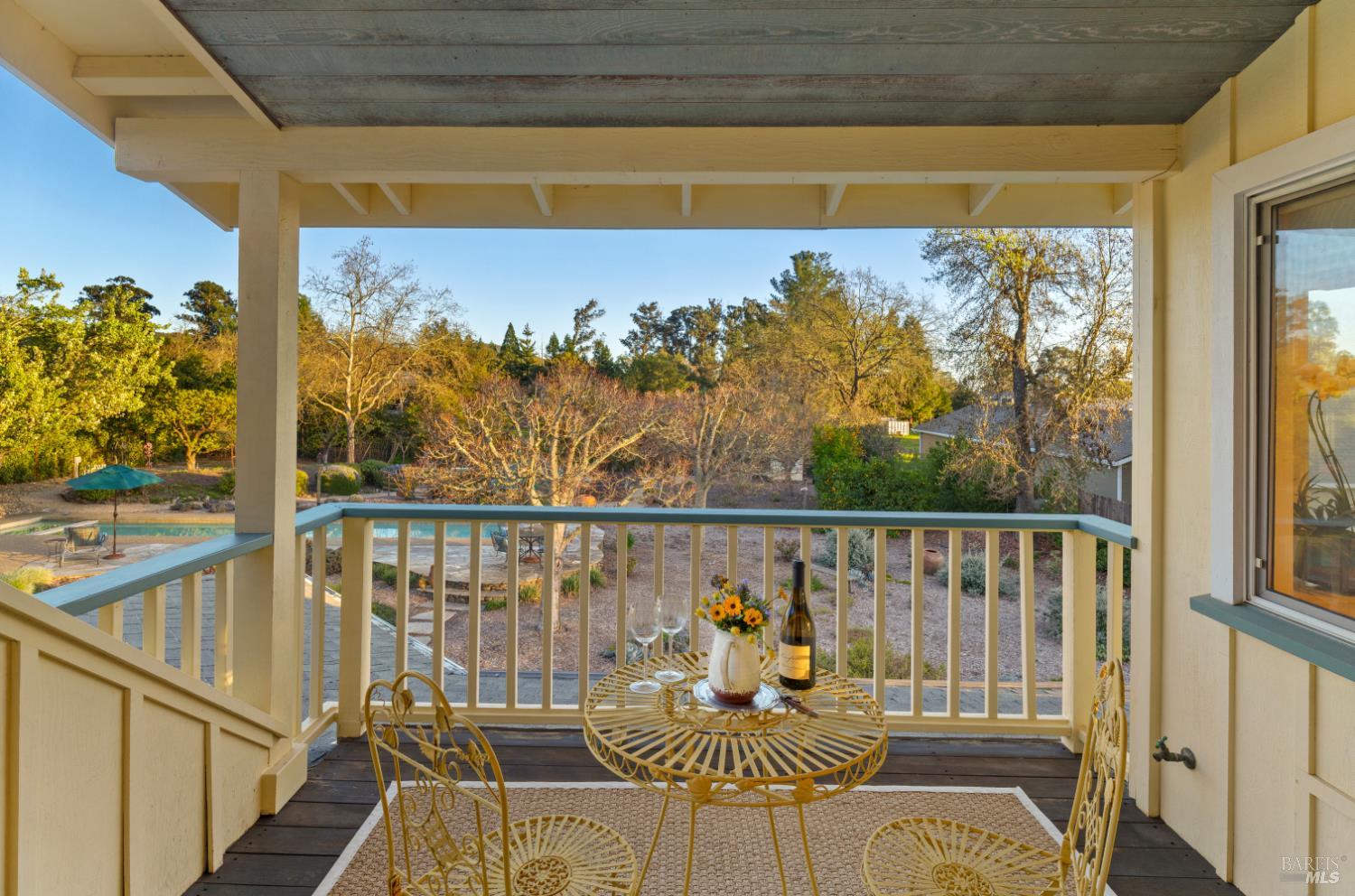 1245 Castle Road Sonoma, CA 95476 - Photo 20 of 48 a view of a balcony with chair and wooden floor