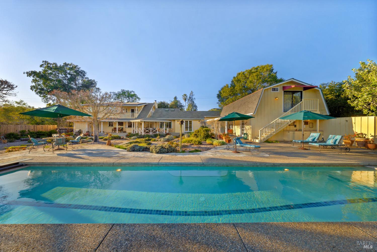 1245 Castle Road Sonoma, CA 95476 - Photo 31 of 48 a front view of a house with a garden