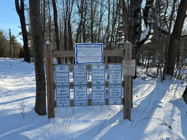 a sign board with a yard