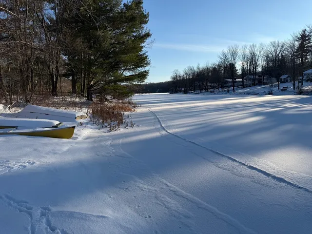 a view of a playground with basketball court