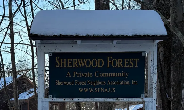 a sign on the wall of a building