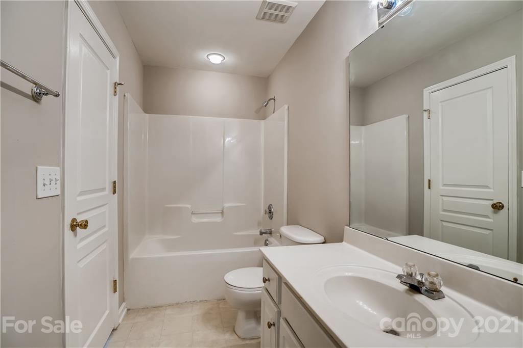 3115 Tanzanite Circle Fort Mill, SC 29708 - Photo 22 of 33 a bathroom with a sink toilet tub and shower