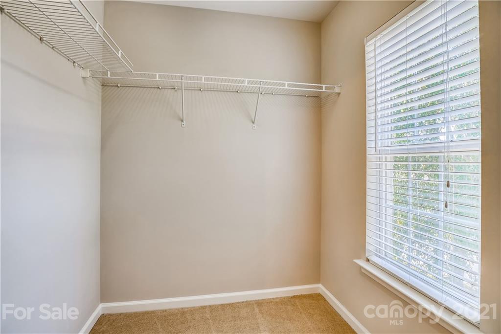 3115 Tanzanite Circle Fort Mill, SC 29708 - Photo 27 of 33 a view of a room with a window and a shower