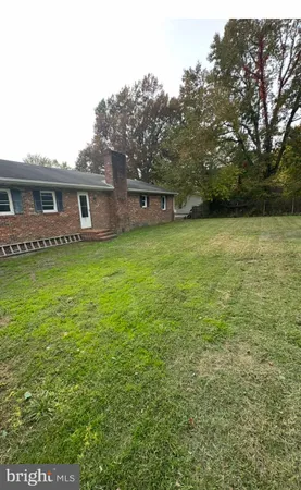 a view of a backyard with a garden