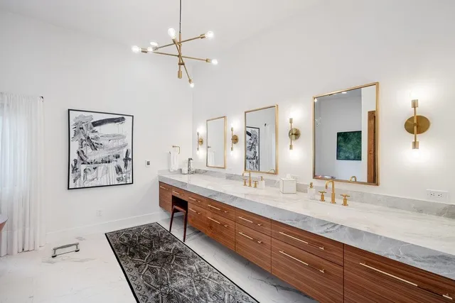 a bathroom with a bathtub and a window