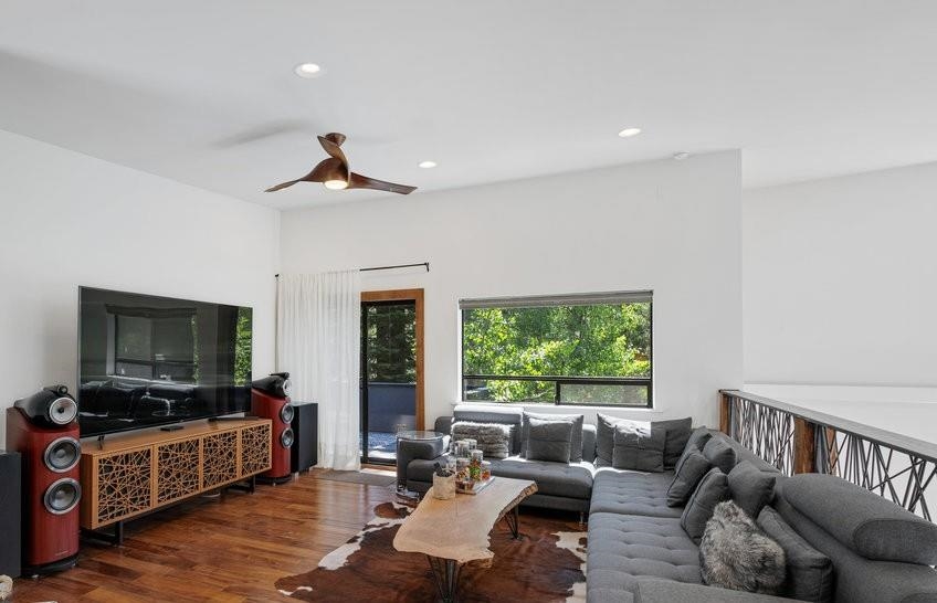 700 Olympic Vly Road Olympic Valley, CA 96146 - Photo 5 of 28 a living room with furniture tv and a window