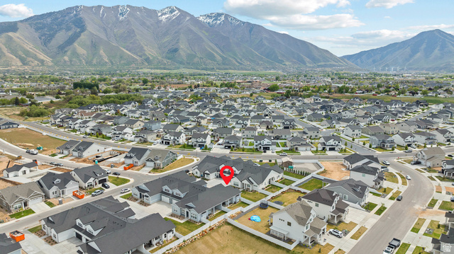 531 North Legend Way West, Unit D Mapleton, UT 84664 - Photo 36 of 42 Aerial view of residential area featuring mountains