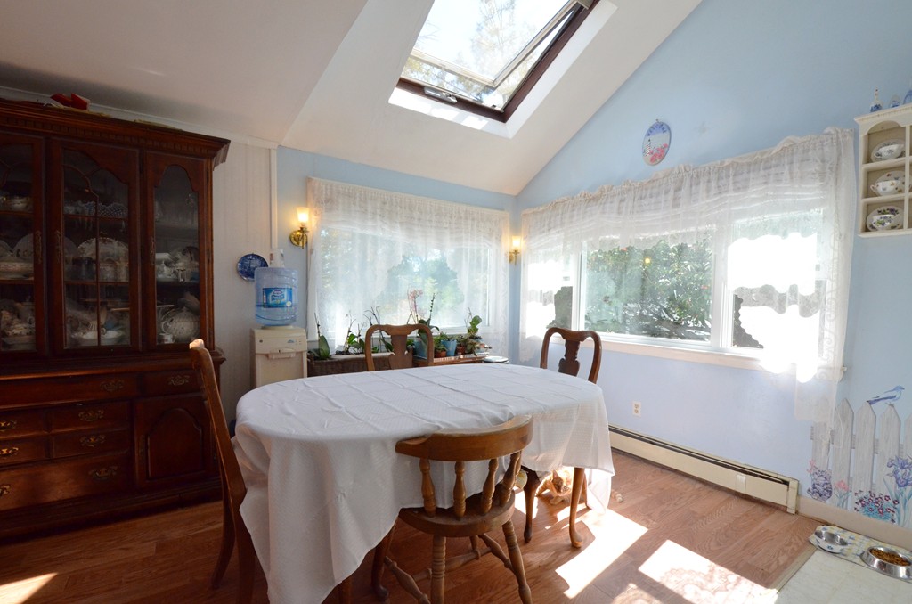 96 Doty Street Waltham, MA 02452 - Photo 5 of 15 a view of a dining room with furniture window and outside view