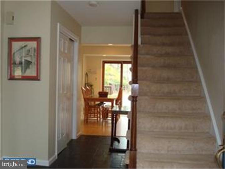 927 Hunt Road Radnor, PA 19008 - Photo 2 of 23 a view of entryway and hall with dining area