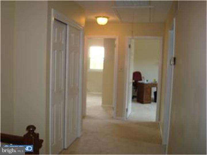 927 Hunt Road Radnor, PA 19008 - Photo 16 of 23 a view of a room that has a glass door shower and a sink
