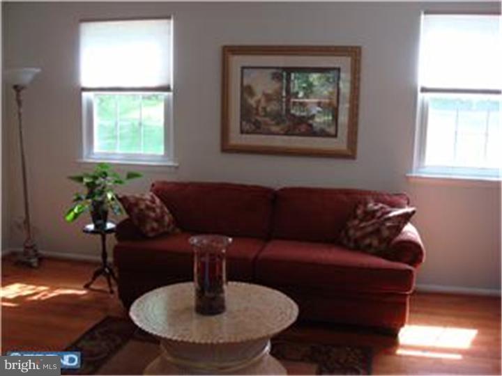 927 Hunt Road Radnor, PA 19008 - Photo 18 of 23 a living room with furniture and a window