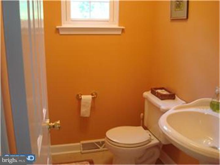 927 Hunt Road Radnor, PA 19008 - Photo 20 of 23 a white toilet sitting next to a window