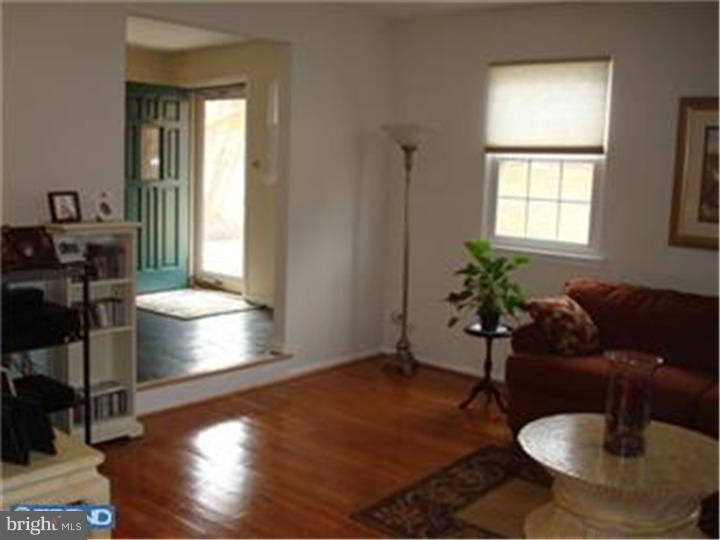 927 Hunt Road Radnor, PA 19008 - Photo 5 of 23 a living room with furniture and a potted plant