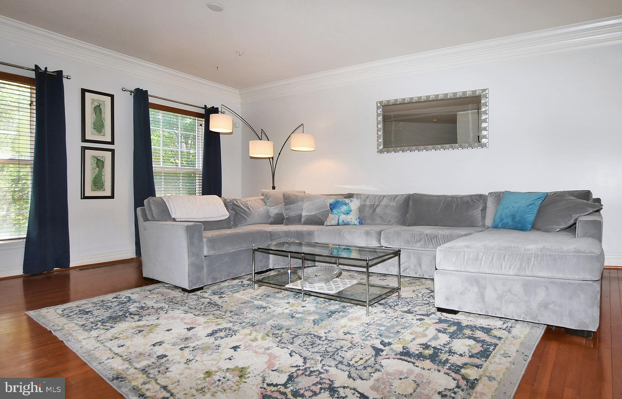 2107 Clark Place Silver Spring, MD 20910 - Photo 6 of 33 Sunny living room w/ beautiful moldings