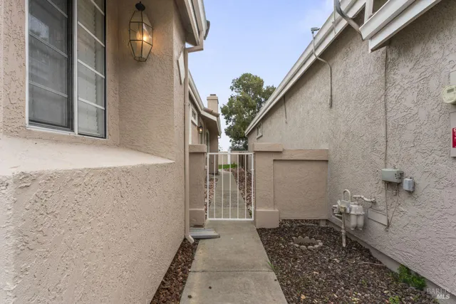 a kitchen with a sink cabinets and window