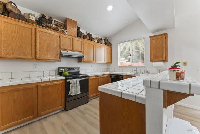 a bathroom with a toilet sink and shower