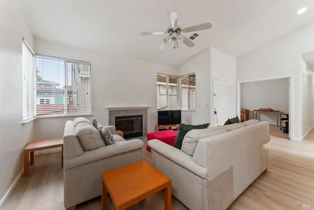 a room with granite countertop lots of wooden furniture