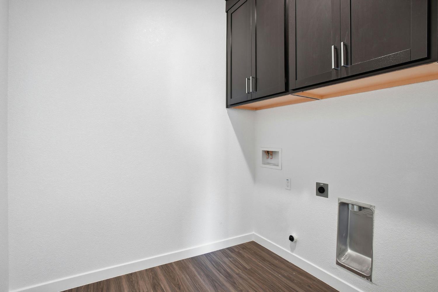1031 Slalom Way Lincoln, CA 95648 - Photo 10 of 12 a view of storage and utility room with wooden floor