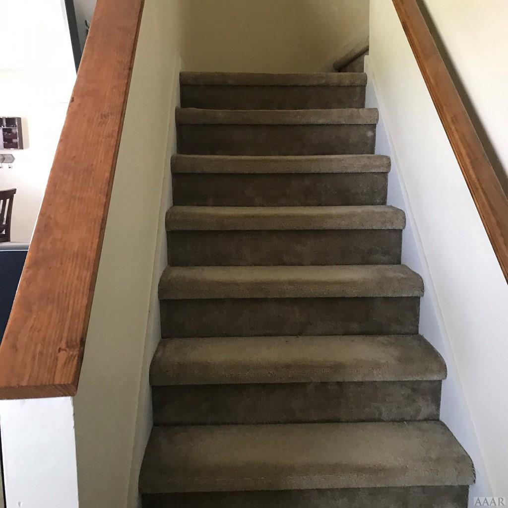 163 Guinea Road Moyock, NC 27958 - Photo 15 of 18 Stairs to additional bedrooms