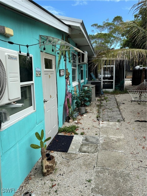3048 Lunar Street Naples, FL 34112 - Photo 17 of 19 a view of a porch with furniture