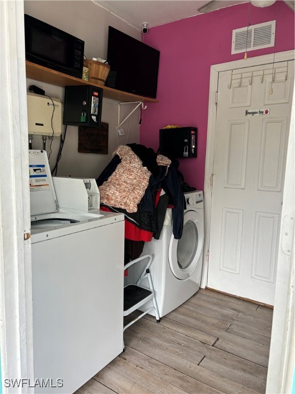 3048 Lunar Street Naples, FL 34112 - Photo 19 of 19 a utility room with dryer and washer