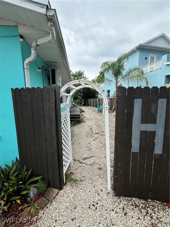 3048 Lunar Street Naples, FL 34112 - Photo 8 of 19 a view of a house with a backyard