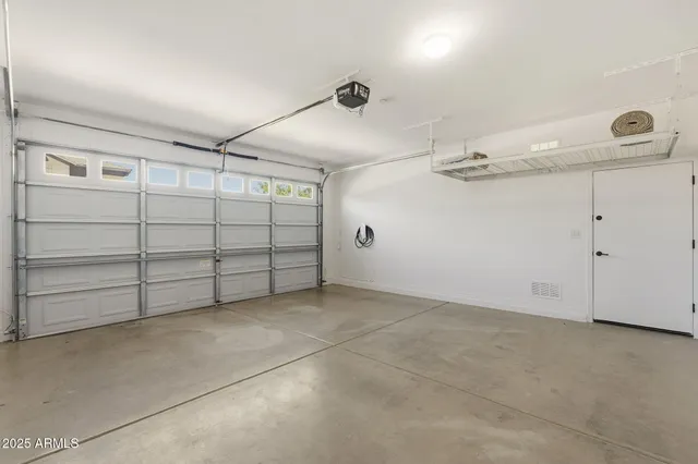 a view of a backyard with a garden