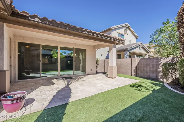 a view of a street with a cars park side of the road