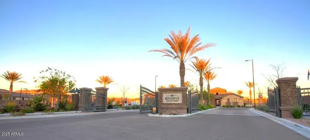 a view of a chairs and table in the patio