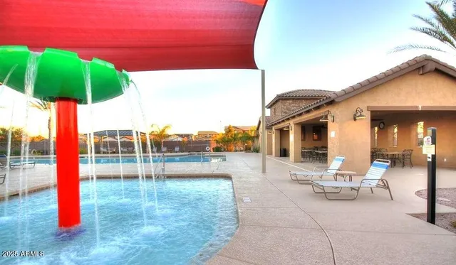 a view of a house with swimming pool