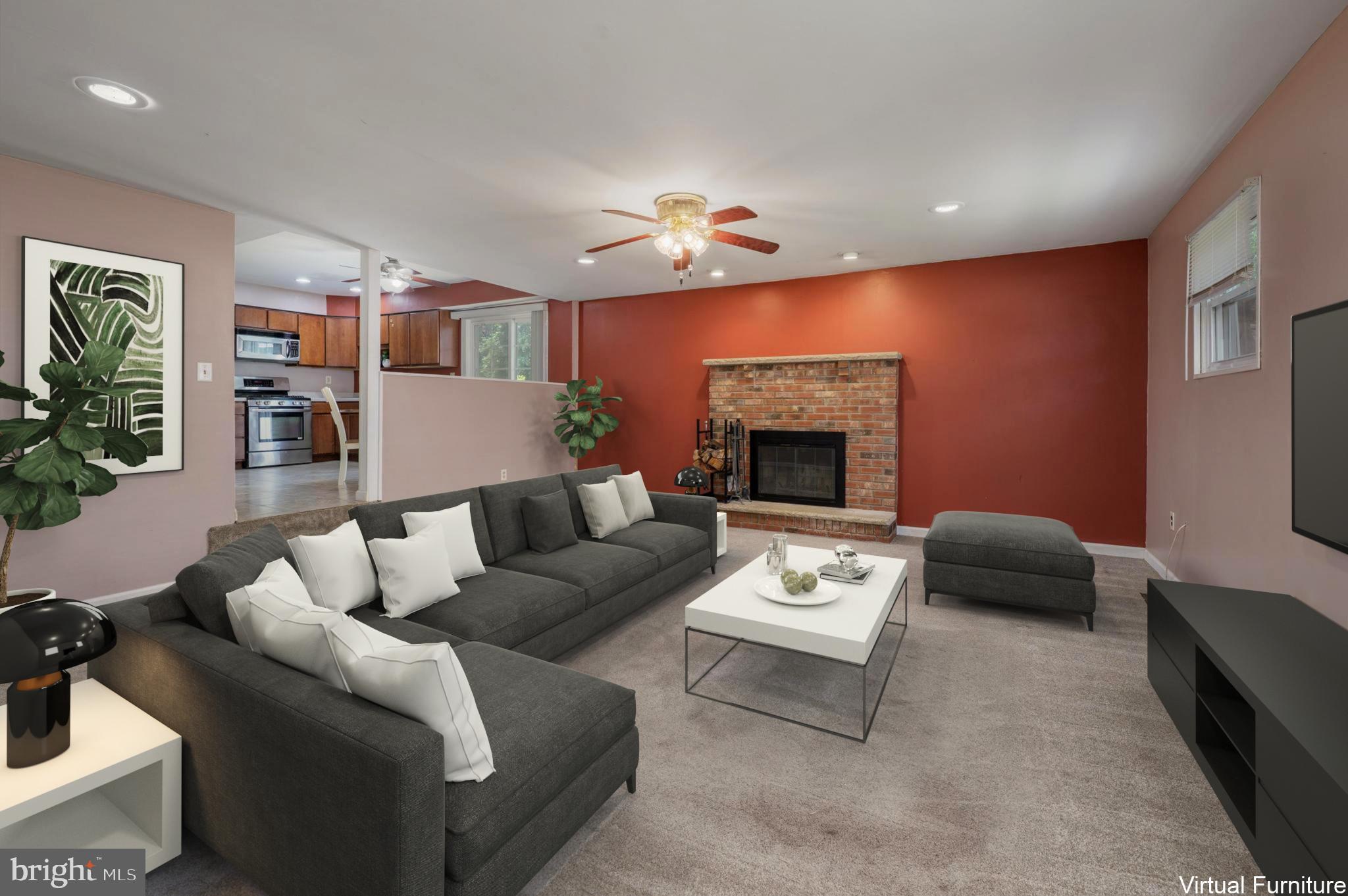 22 Clemson Road Cherry Hill, NJ 08034 - Photo 20 of 41 a living room with furniture and a fireplace