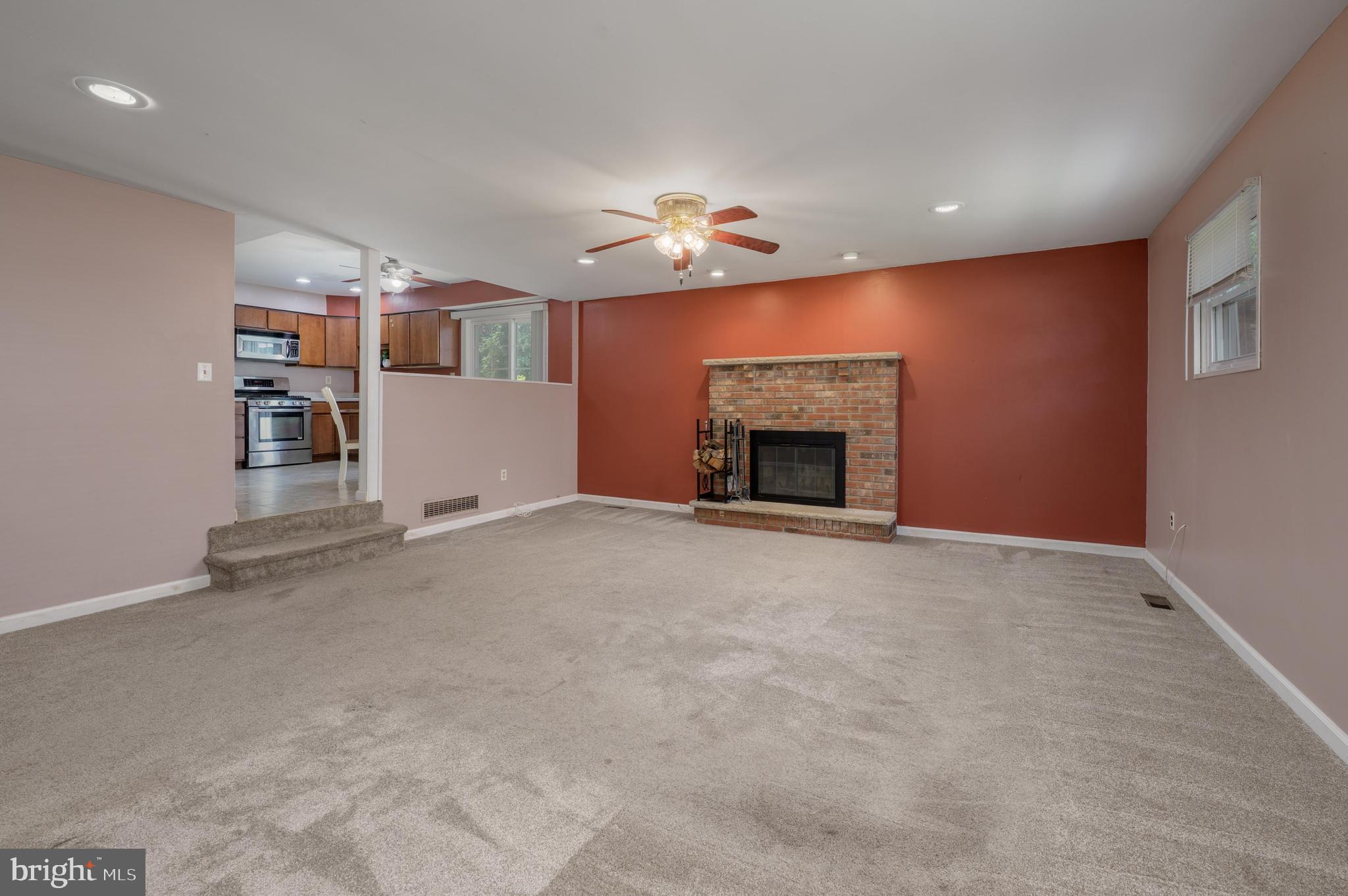 22 Clemson Road Cherry Hill, NJ 08034 - Photo 21 of 41 an empty room with furniture and fireplace