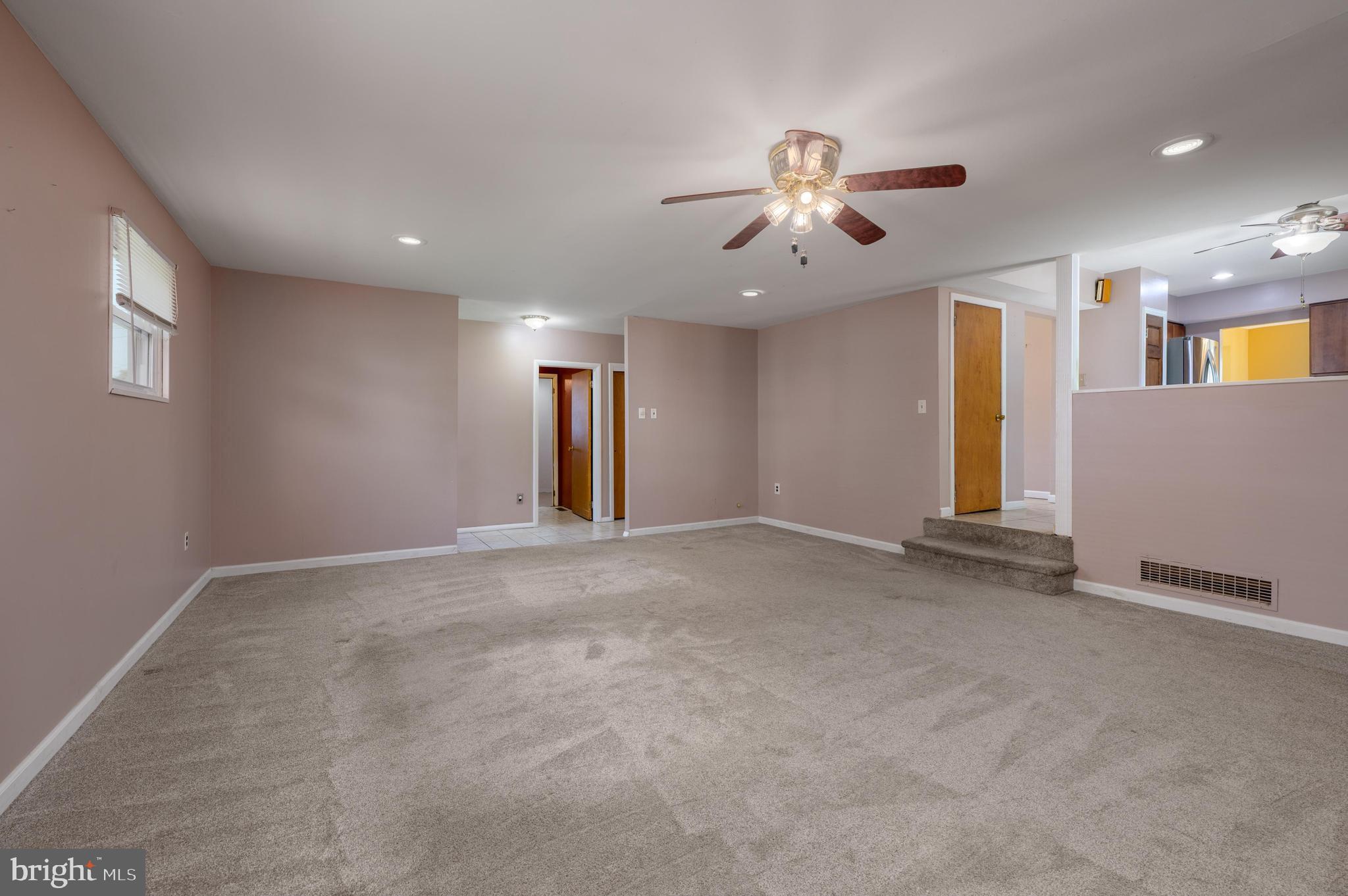 22 Clemson Road Cherry Hill, NJ 08034 - Photo 23 of 41 an empty room with windows and ceiling fan