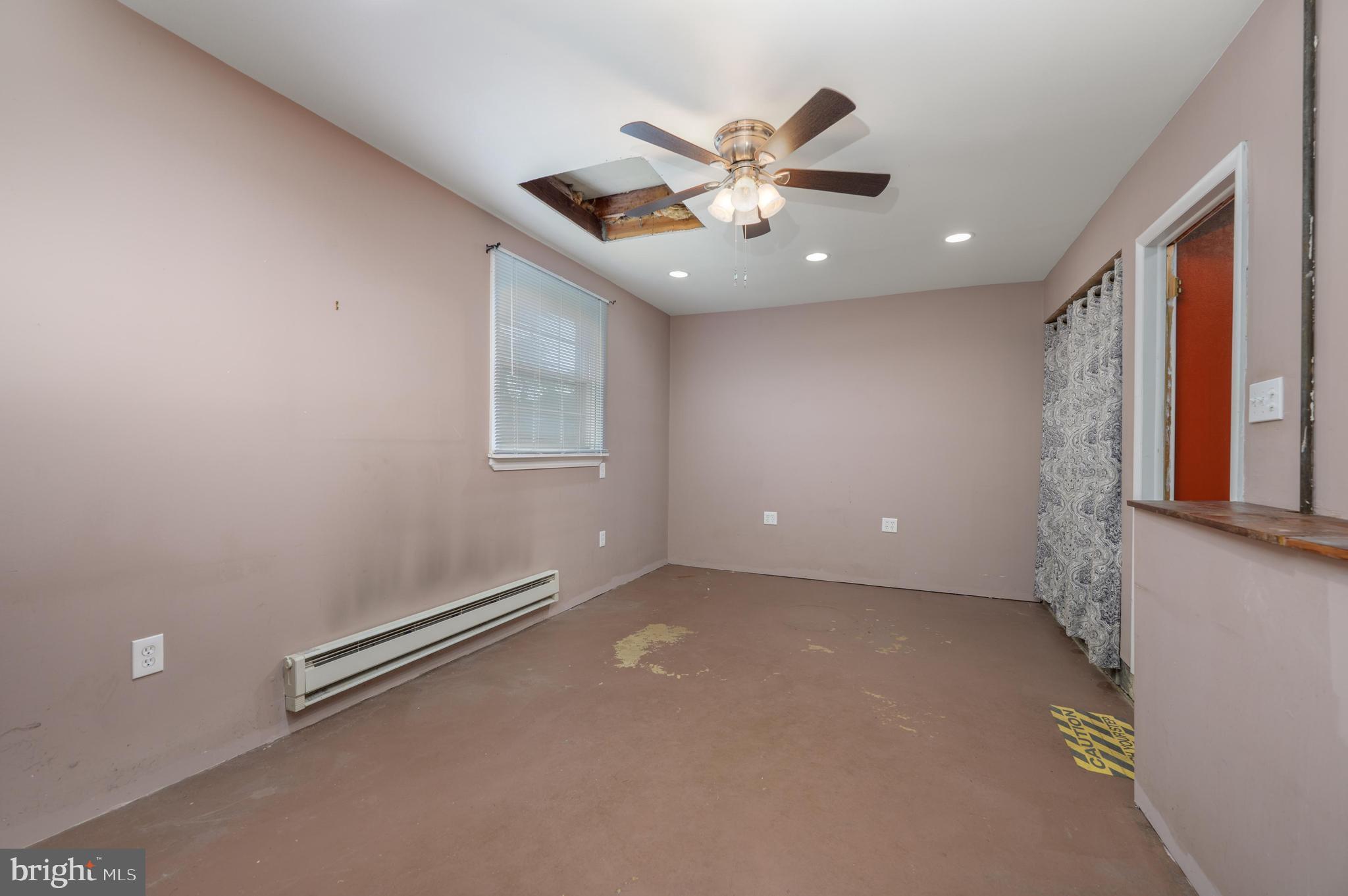 22 Clemson Road Cherry Hill, NJ 08034 - Photo 28 of 41 an empty room with windows and fan