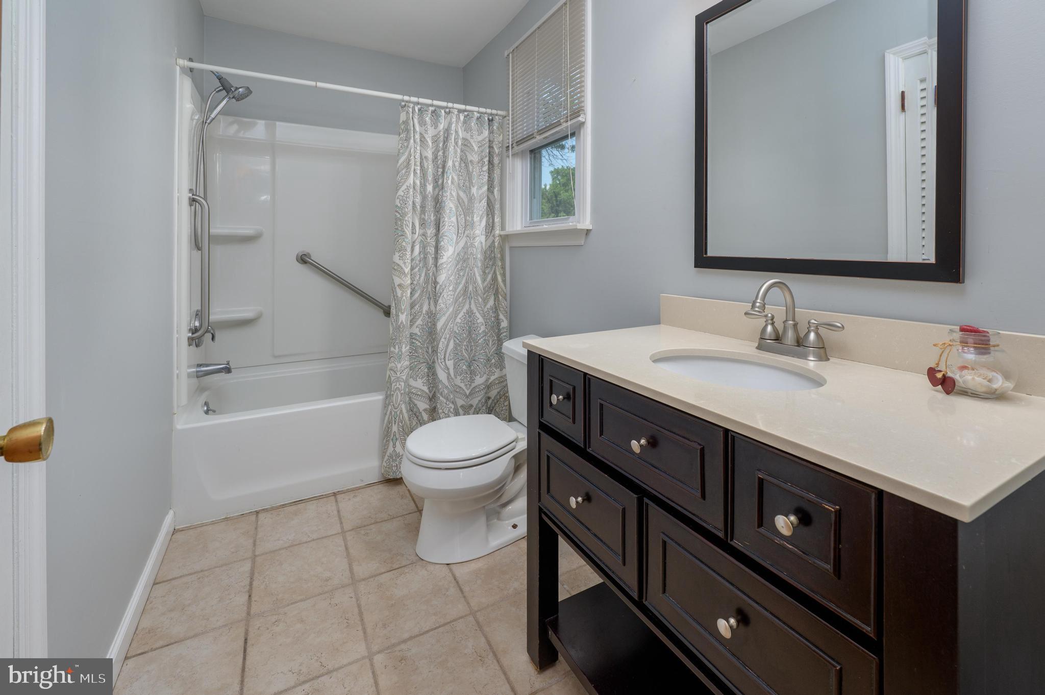 22 Clemson Road Cherry Hill, NJ 08034 - Photo 34 of 41 a bathroom with a sink a toilet and shower