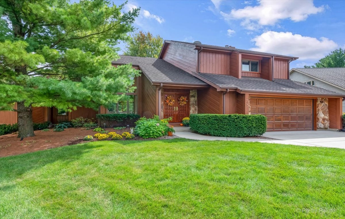 245 Perth Road Cary, IL 60013 - Photo 2 of 61 a view of a house with a yard and plants
