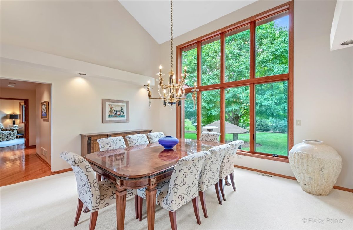 245 Perth Road Cary, IL 60013 - Photo 12 of 61 a dining room with furniture and a large window