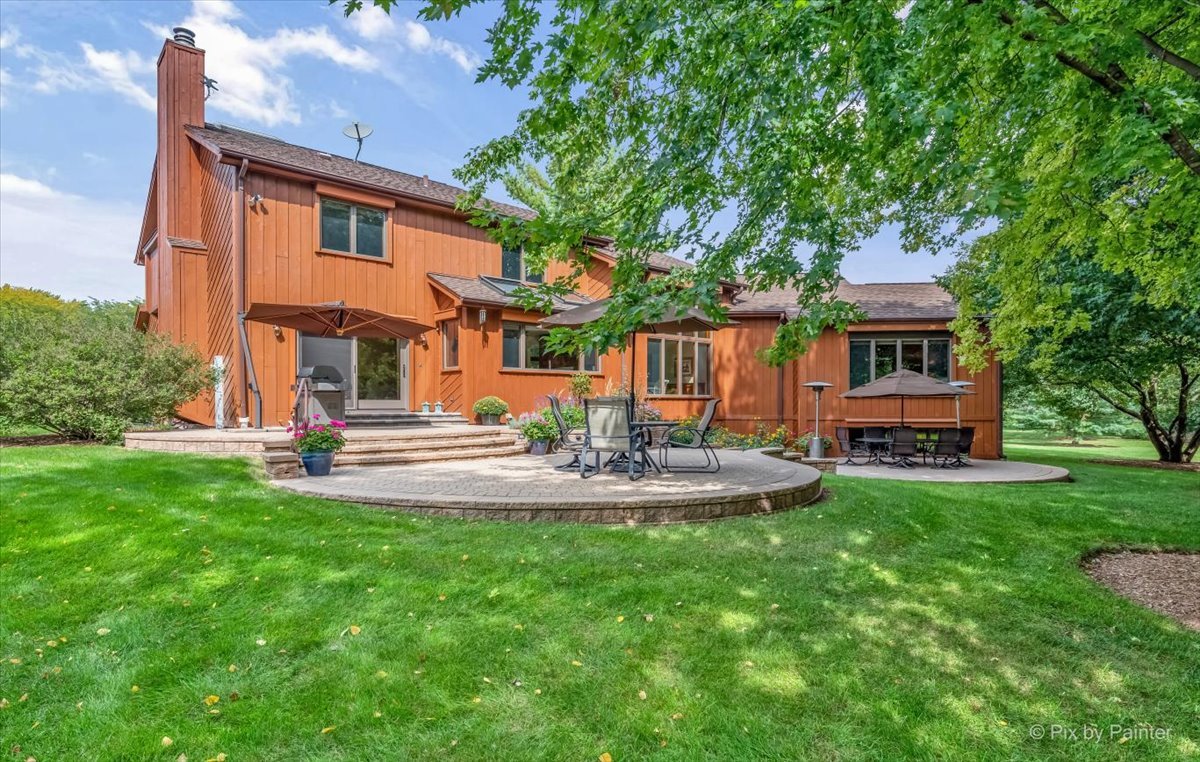 245 Perth Road Cary, IL 60013 - Photo 54 of 61 a front view of house with yard and outdoor seating