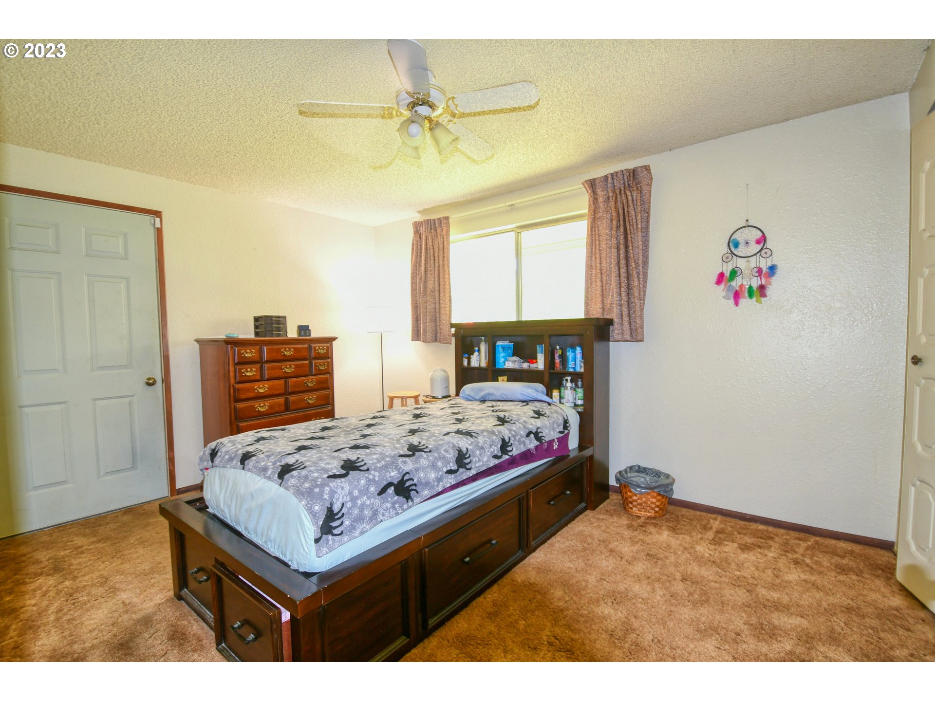 2108 Southwest Olson Avenue Pendleton, OR 97801 - Photo 36 of 47 a bedroom with a bed and a table in it