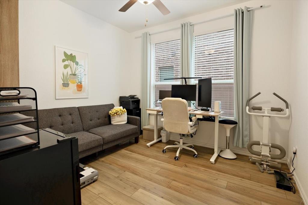 528 Poplar Street Princeton, TX 75407 - Photo 19 of 39 a living room with furniture a rug and a window