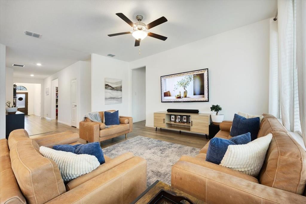 528 Poplar Street Princeton, TX 75407 - Photo 22 of 39 a living room with furniture and a large window