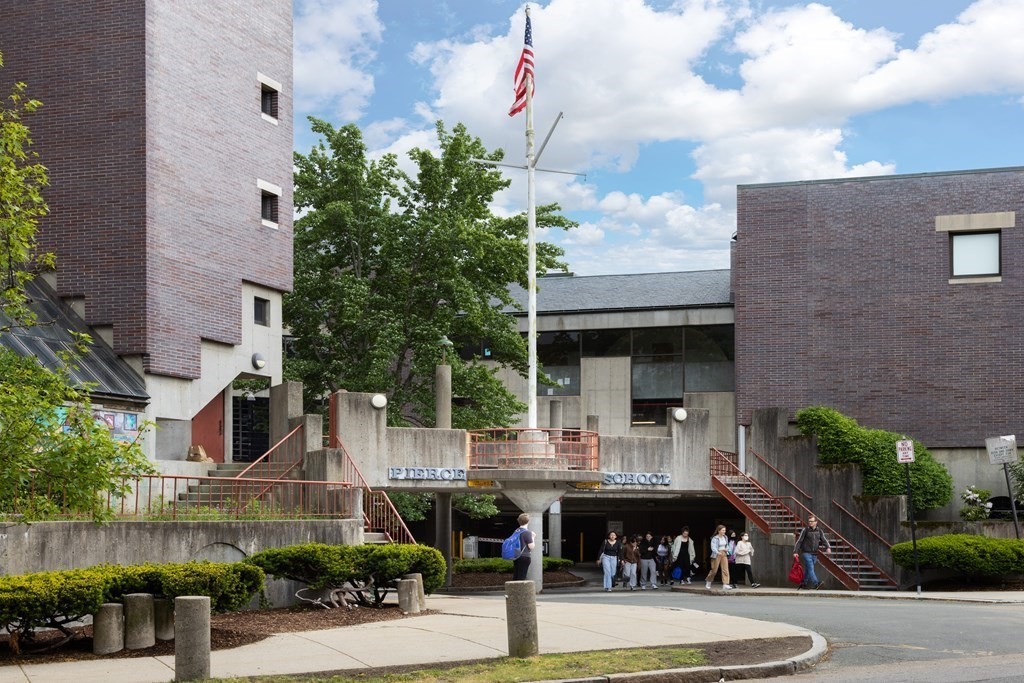 152 Harvard Street, Unit 4 Brookline, MA 02446 - Photo 23 of 26 a view of a building with outdoor space