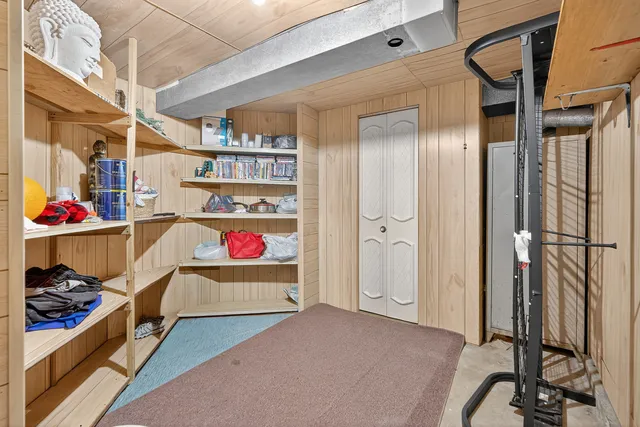 a kitchen with cabinets and window