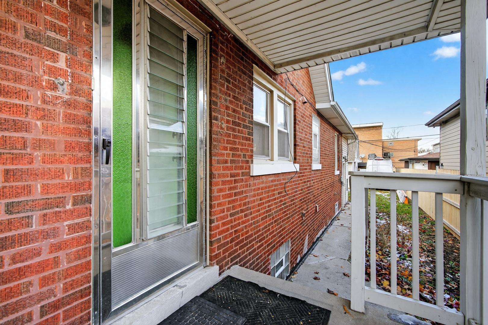 7346 57th Place Summit, IL 60501 - Photo 2 of 29 a view of a balcony with wooden floor
