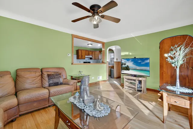 a living room with furniture and a table