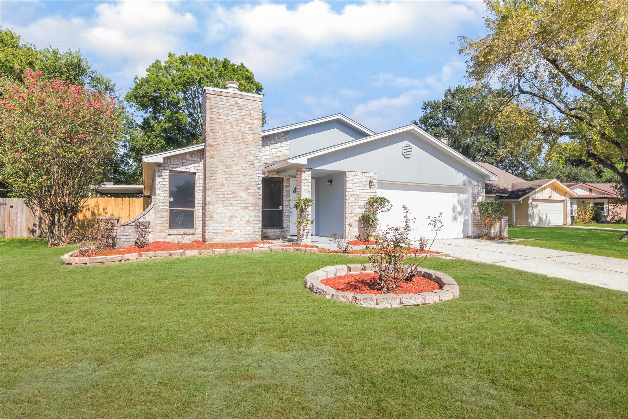 22914 Summer Pine Lane Spring, TX 77373 - Photo 1 of 19 a front view of a house with a big yard potted plants and large tree