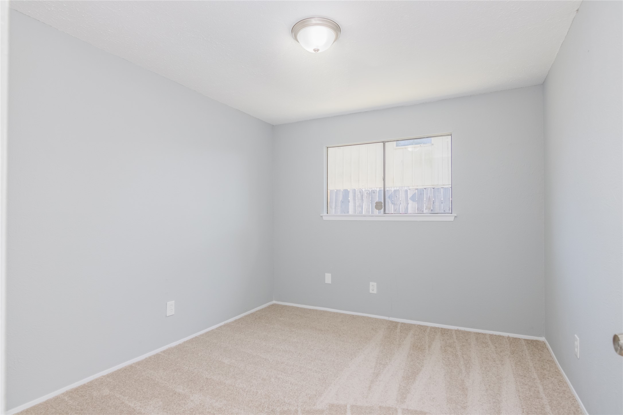 22914 Summer Pine Lane Spring, TX 77373 - Photo 15 of 19 an empty room with a window