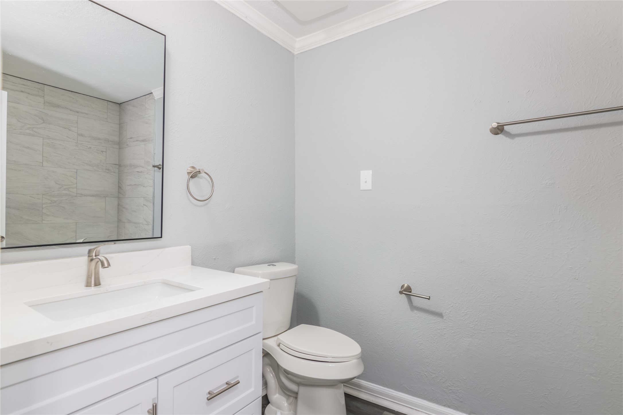 22914 Summer Pine Lane Spring, TX 77373 - Photo 16 of 19 a bathroom with a sink a toilet and a mirror