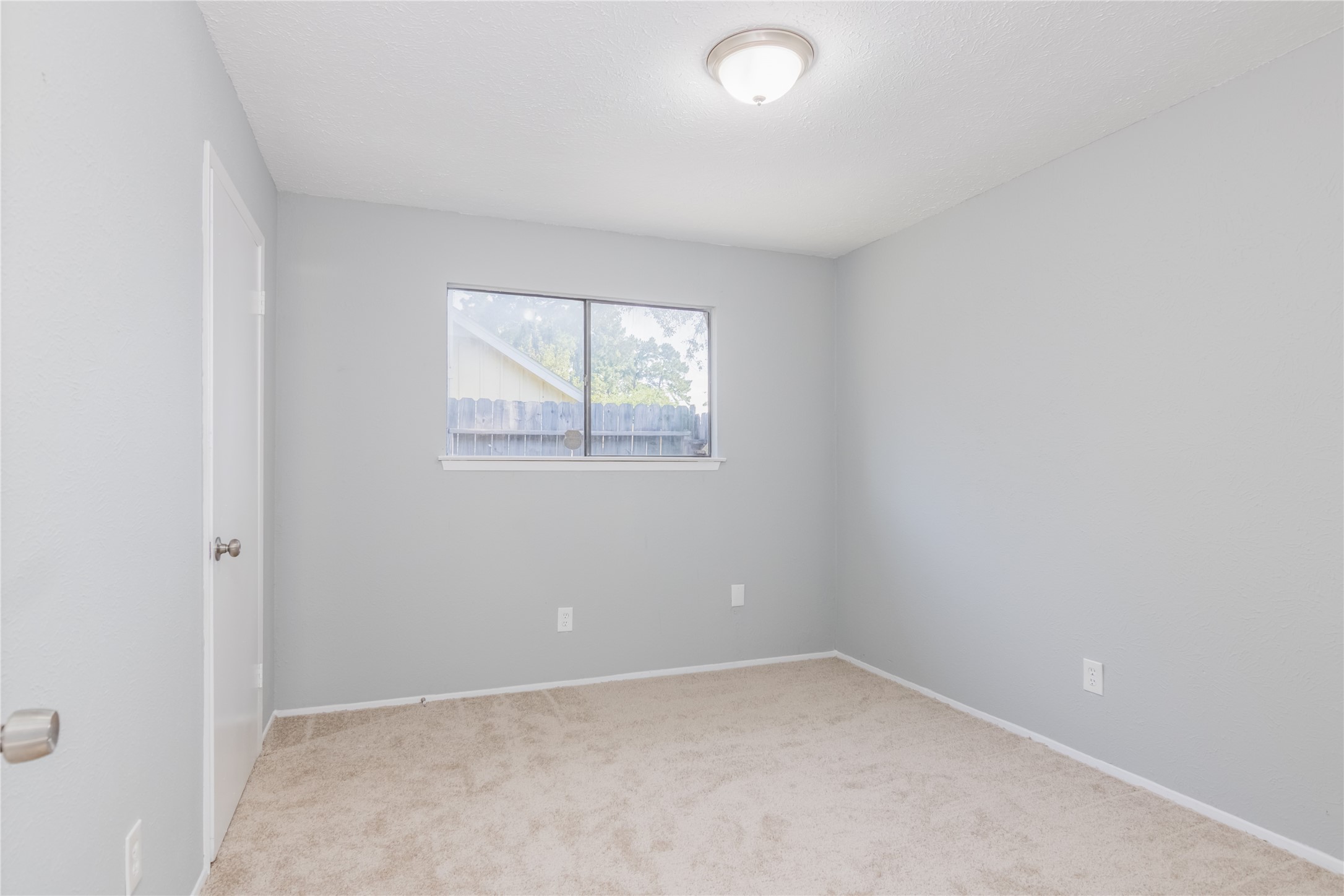 22914 Summer Pine Lane Spring, TX 77373 - Photo 18 of 19 an empty room with a window
